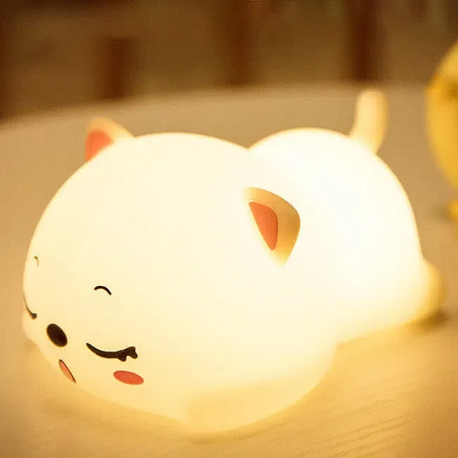 Veilleuse chat couché style kawaii avec changement de couleurs
